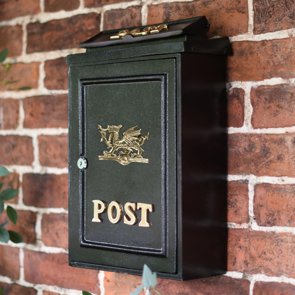Polished Brass Welsh Dragon motif postal box on wall