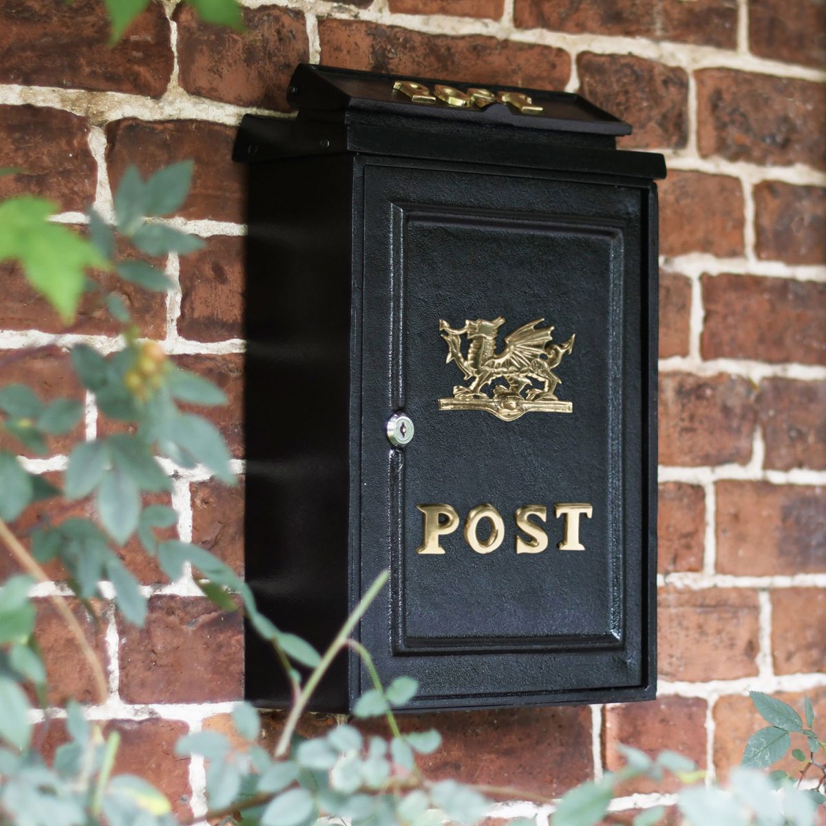 Deluxe Polished Brass “Draig- Welsh Dragon" Wall Mounted Post Box in Situ