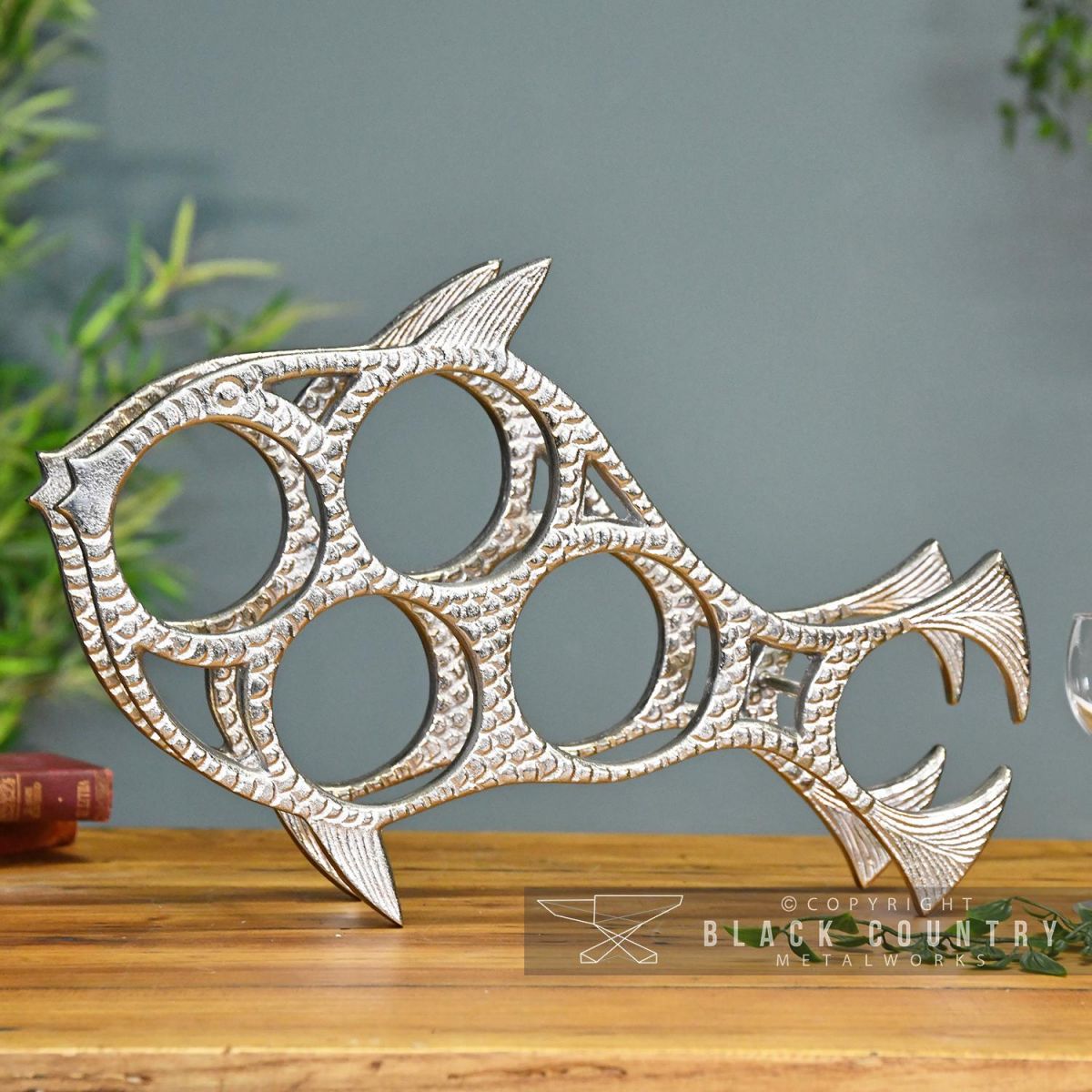 Front View of the Polished Nickel "Fish" Wine Rack 