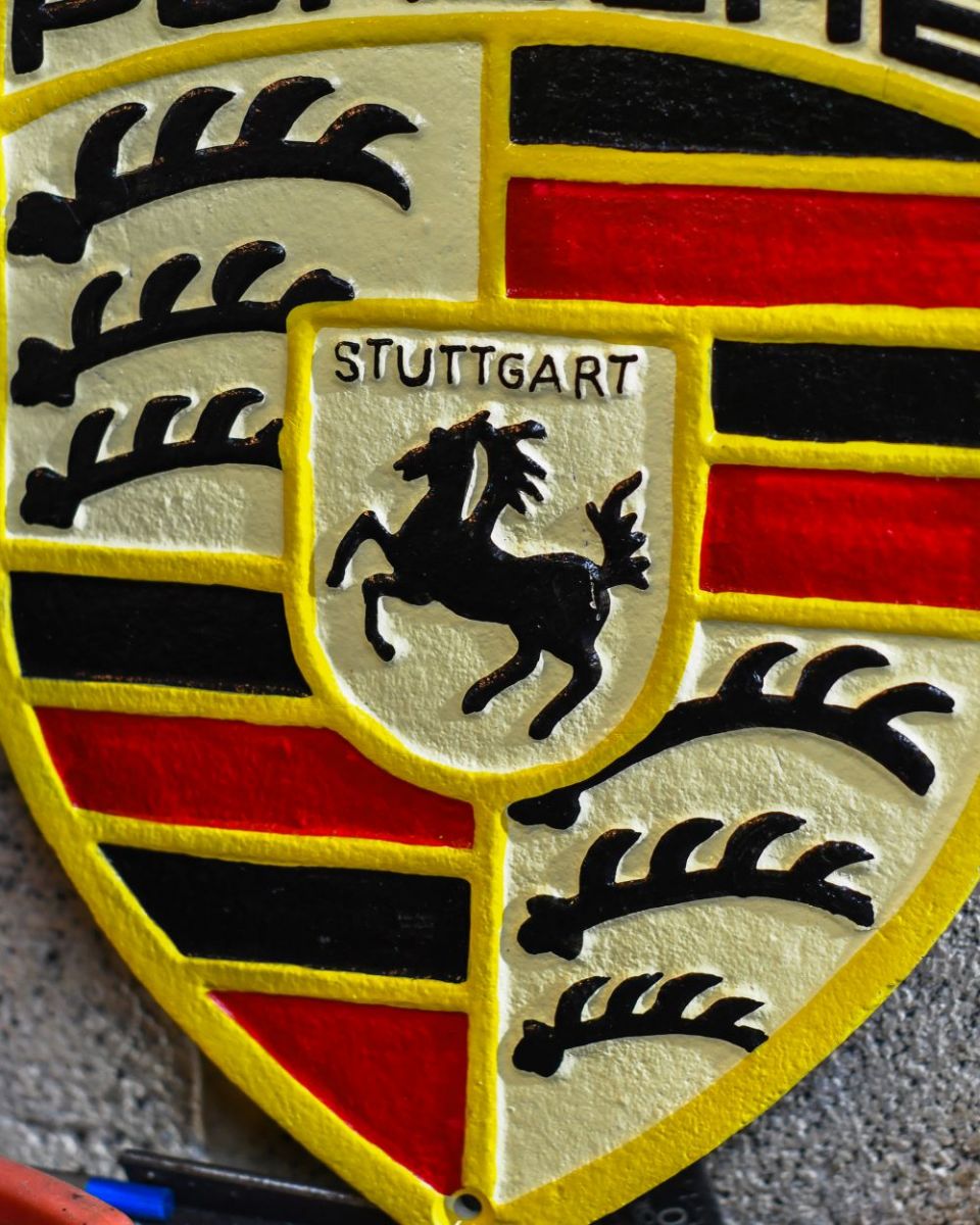 Close up of "Porsche" Vintage Style Sign finish