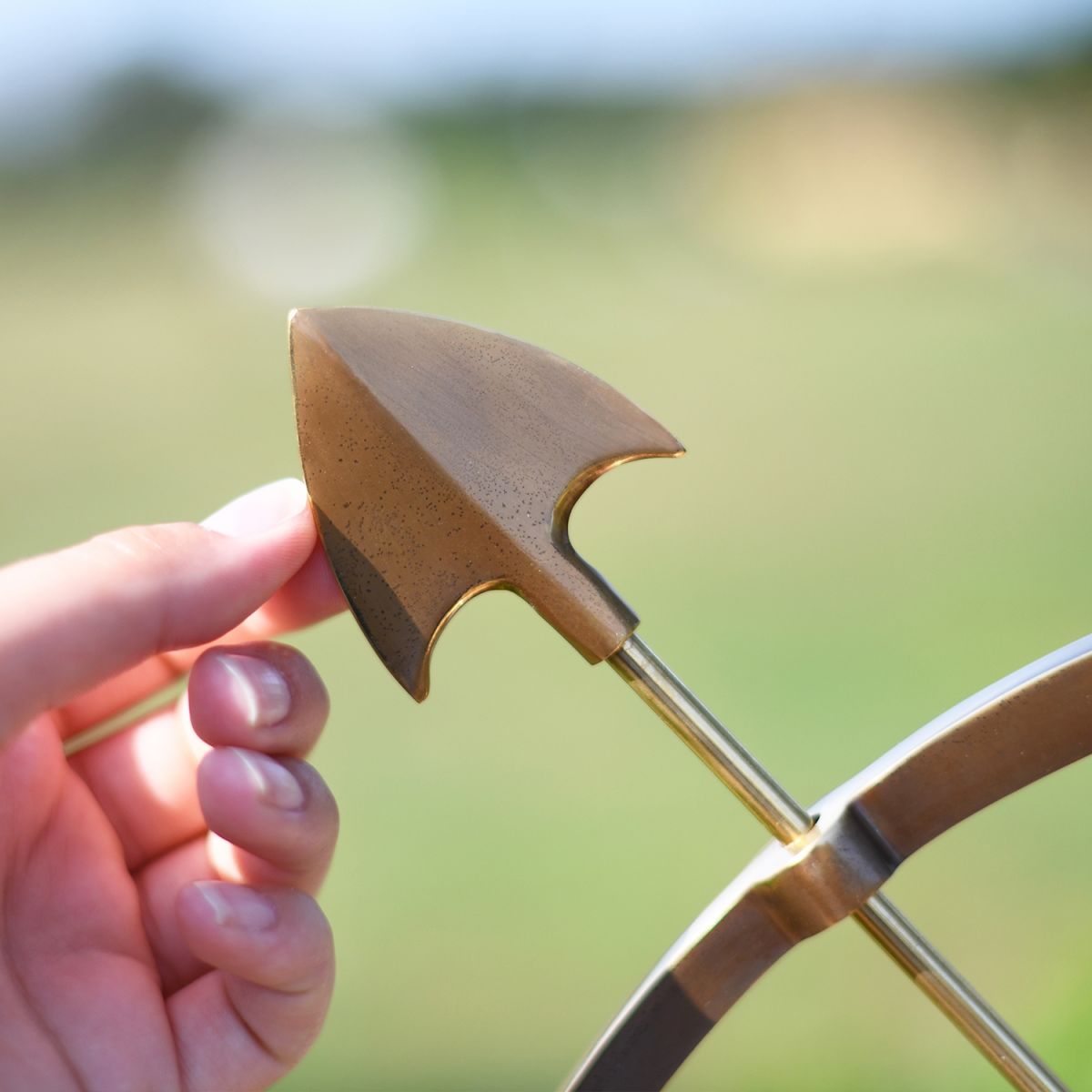Close-up of the Arrow on the Armillary