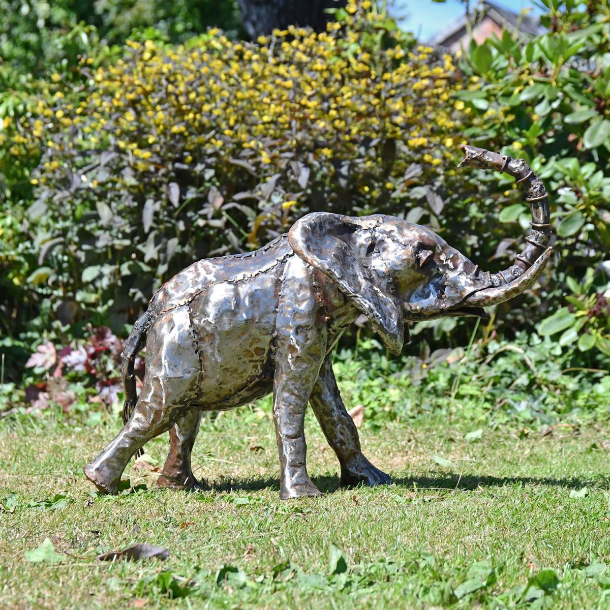 Side View of the Recycled Metal Elephant with Trunk Up