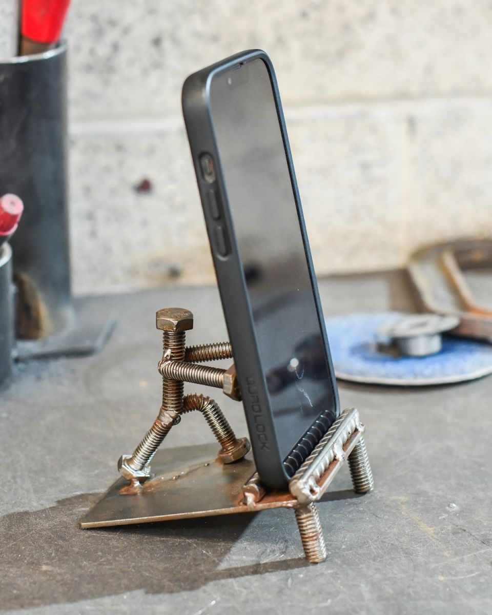 In situ photo of scrap metal phone holder 