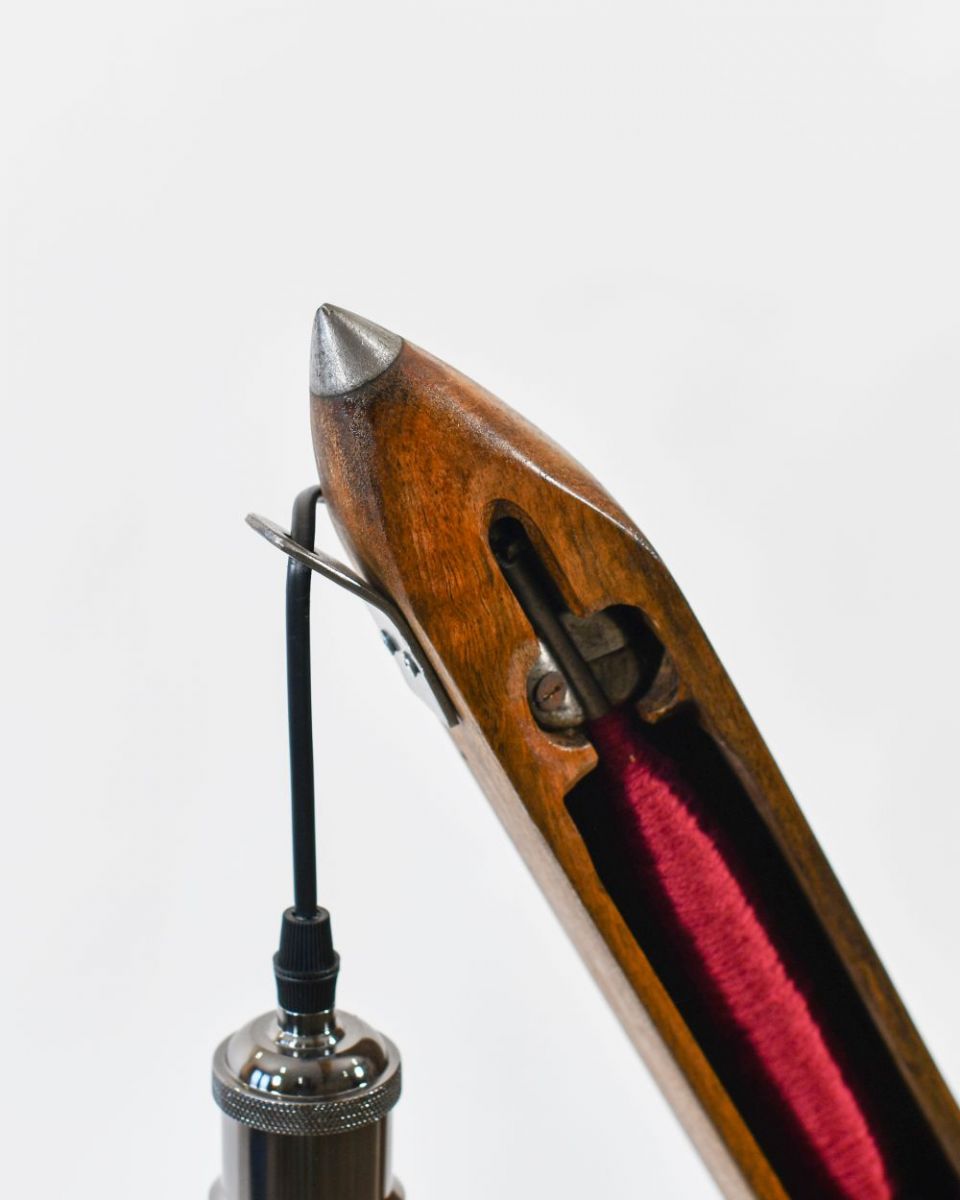 Close up of Red Loom Bobbin Table Lamp metal detailing