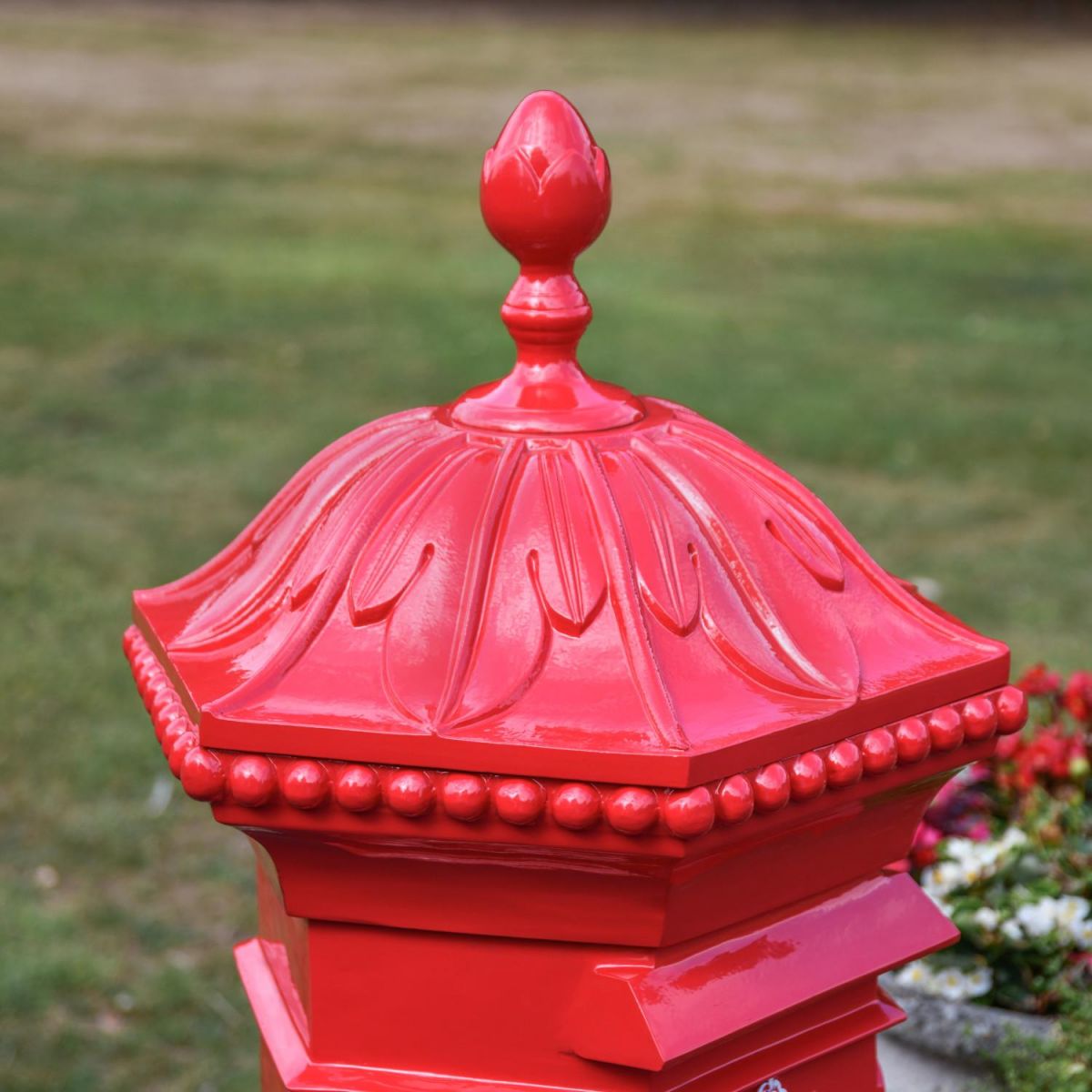 Close-Up of Lid on Penfold Pillar Post Box - Red Finish