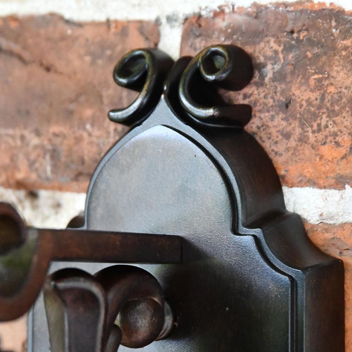 Ornate Back Plate on the Renaissance Style Standard Hanging Bronze Wall Lantern