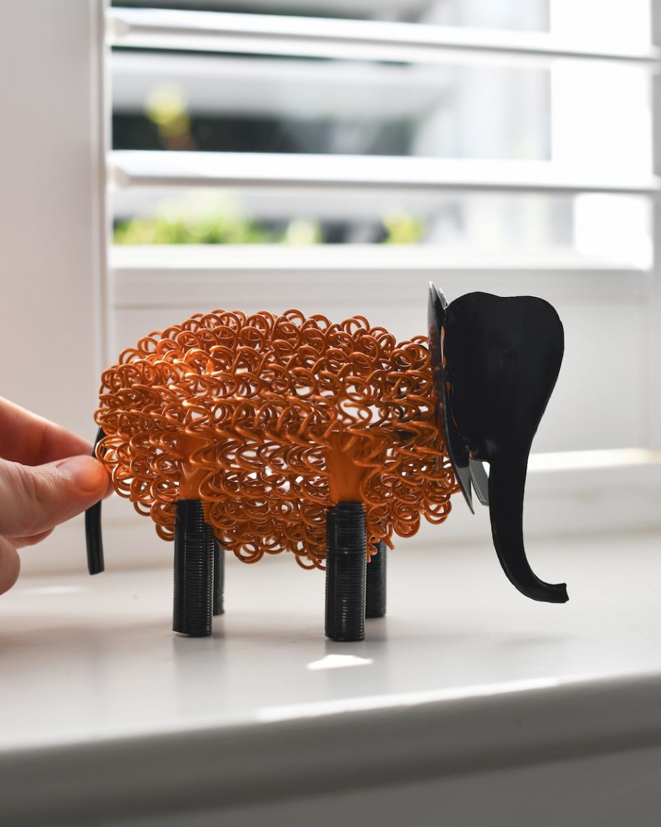 Scale image of recycled metal art sculpture