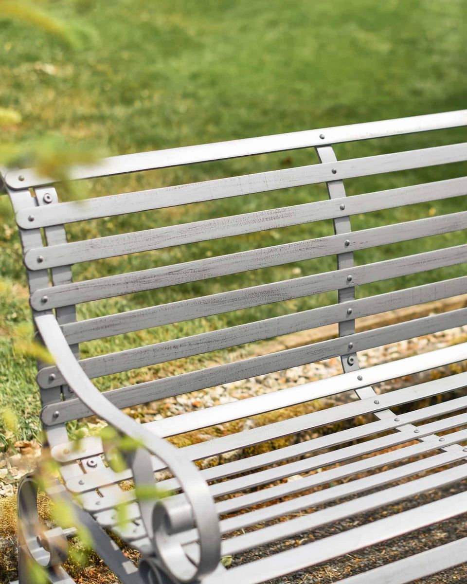Close-Up of Grey Robust “Chatham" Three Seater Park Bench