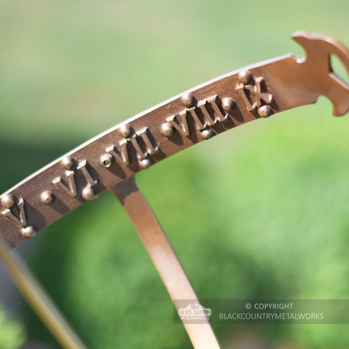 Roman Numerals inside the Armillary