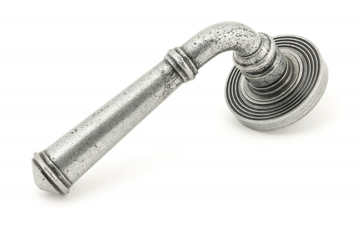 Rounded Pewter Lever Door Handle on Beehive Rose Handle