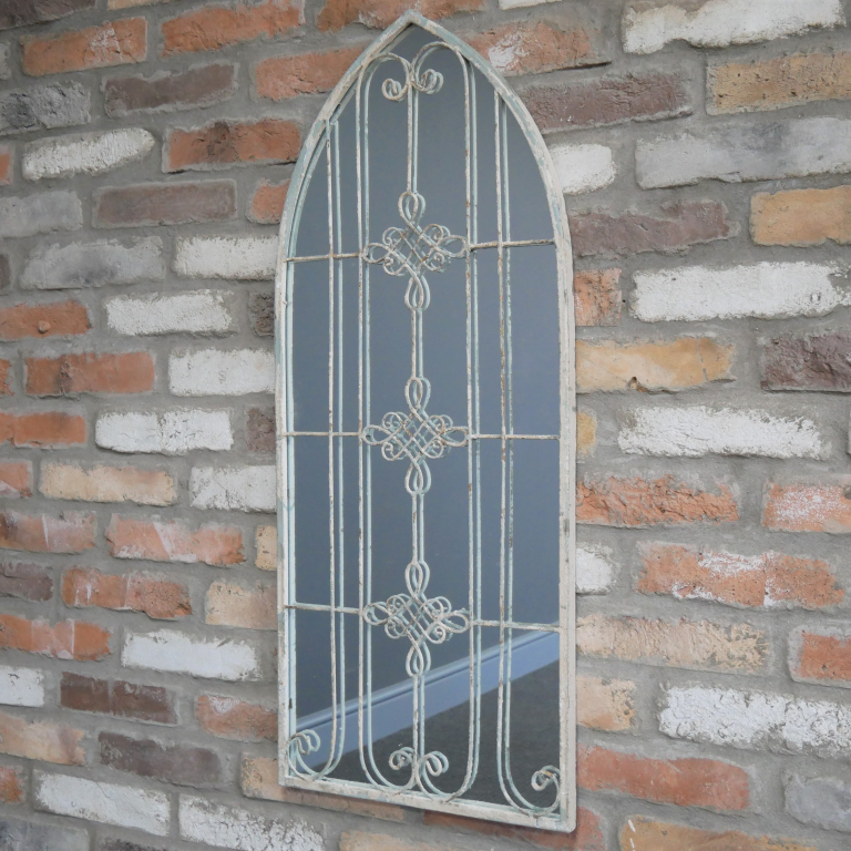 Rustic Arch Wall Mounted Mirror in situ on a Brick Wall
