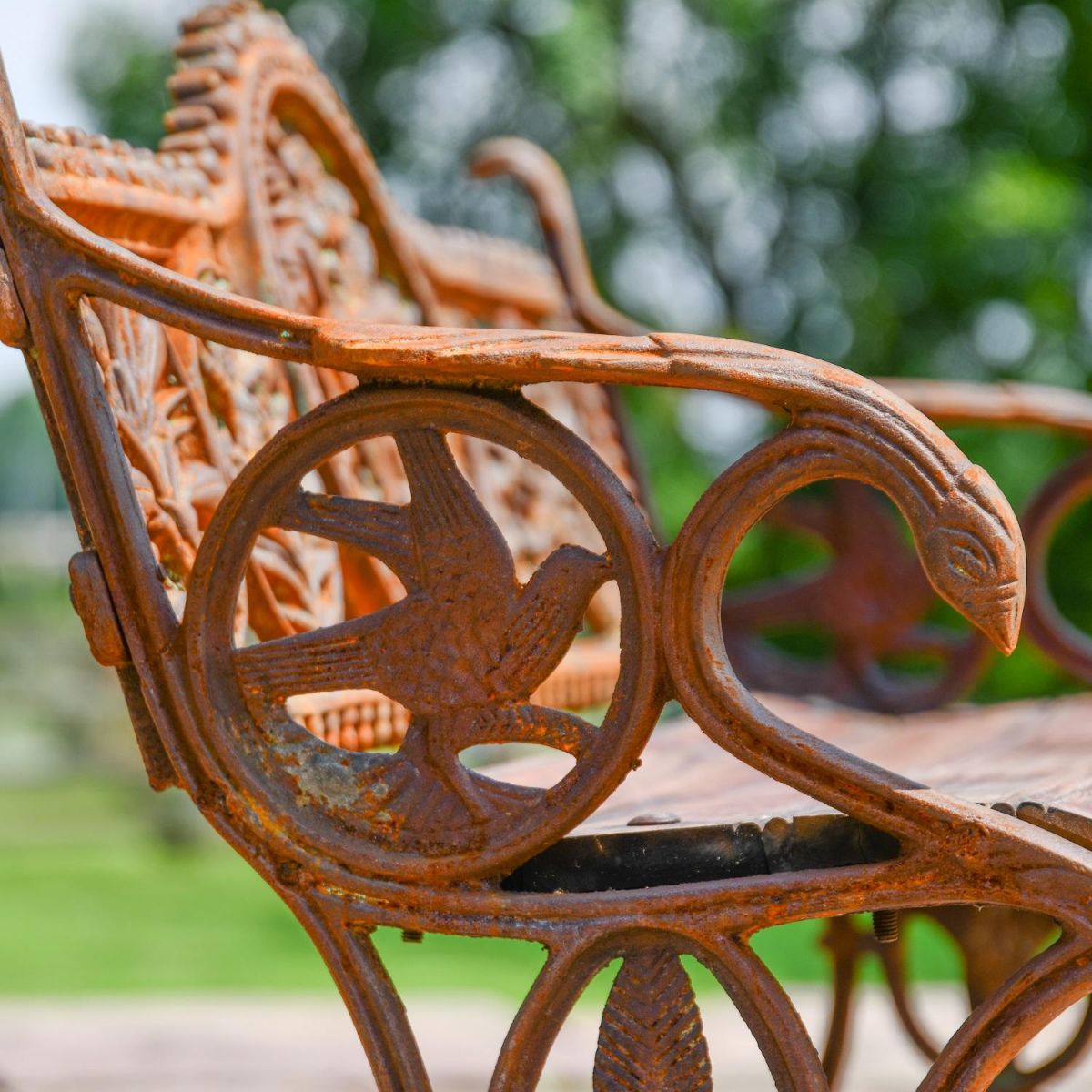 Close up of Rustic Cast Iron Arm rest with bird motif
