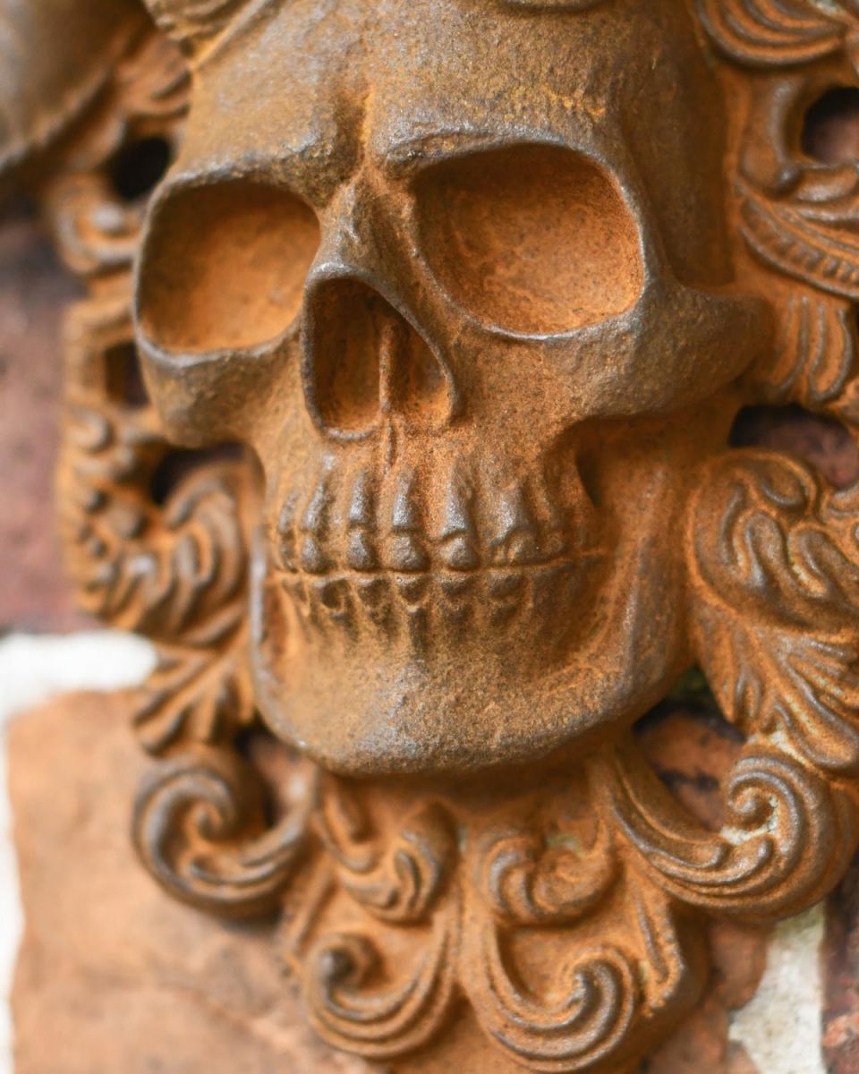 Close-Up of Rustic Cast Iron "El Diablo" Exterior Wall Art