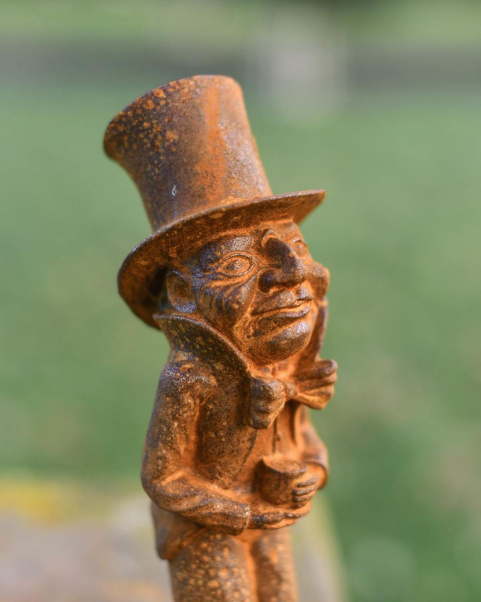 Close-Up of Rustic Cast Iron "Old Codger" Freestanding Garden Sculpture