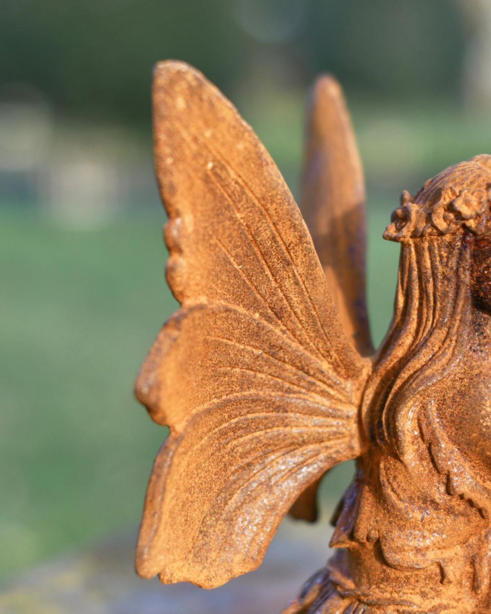 Close-Up of Rustic Cast Iron "Winged Angel" Garden Sculpture
