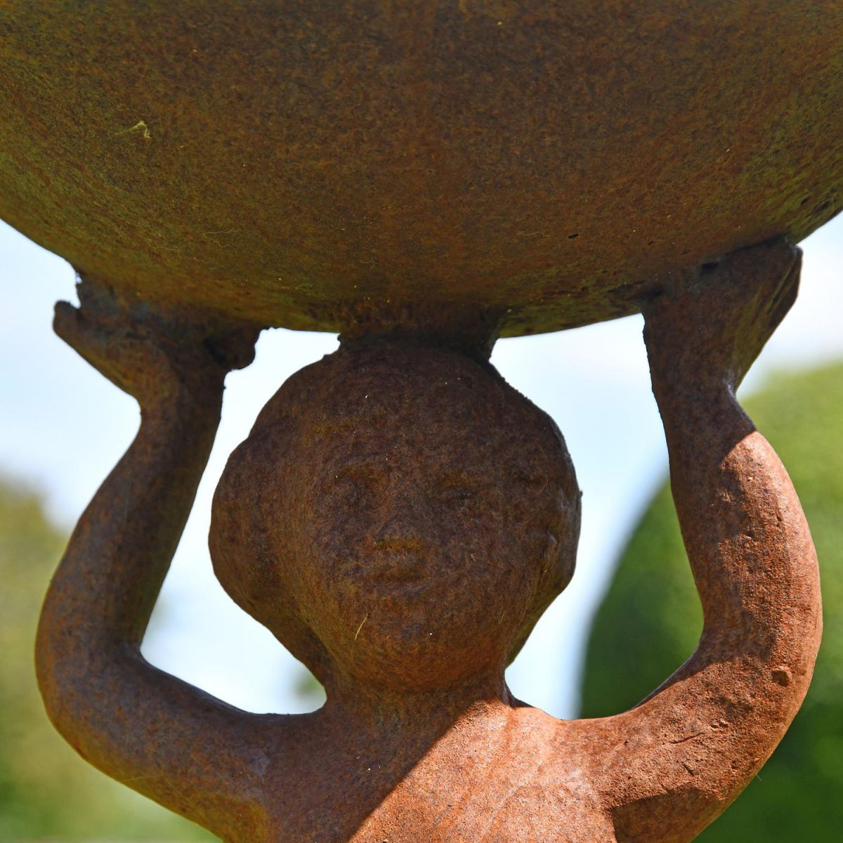 Close-up of the Rustic Cherub Design on the Bird Bath
