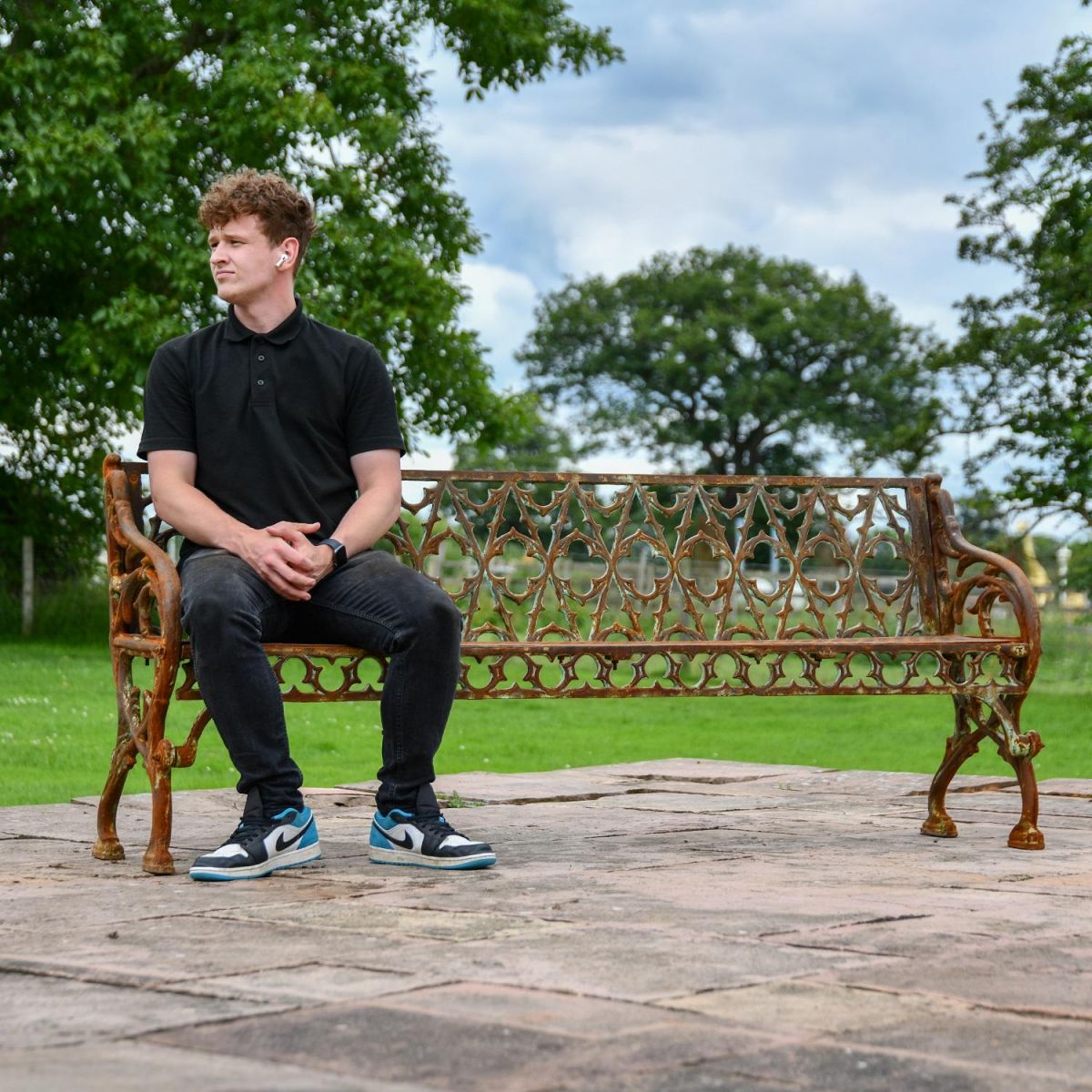 Rustic "Quatrefoil" Three Seater Garden Bench with Male for Scale