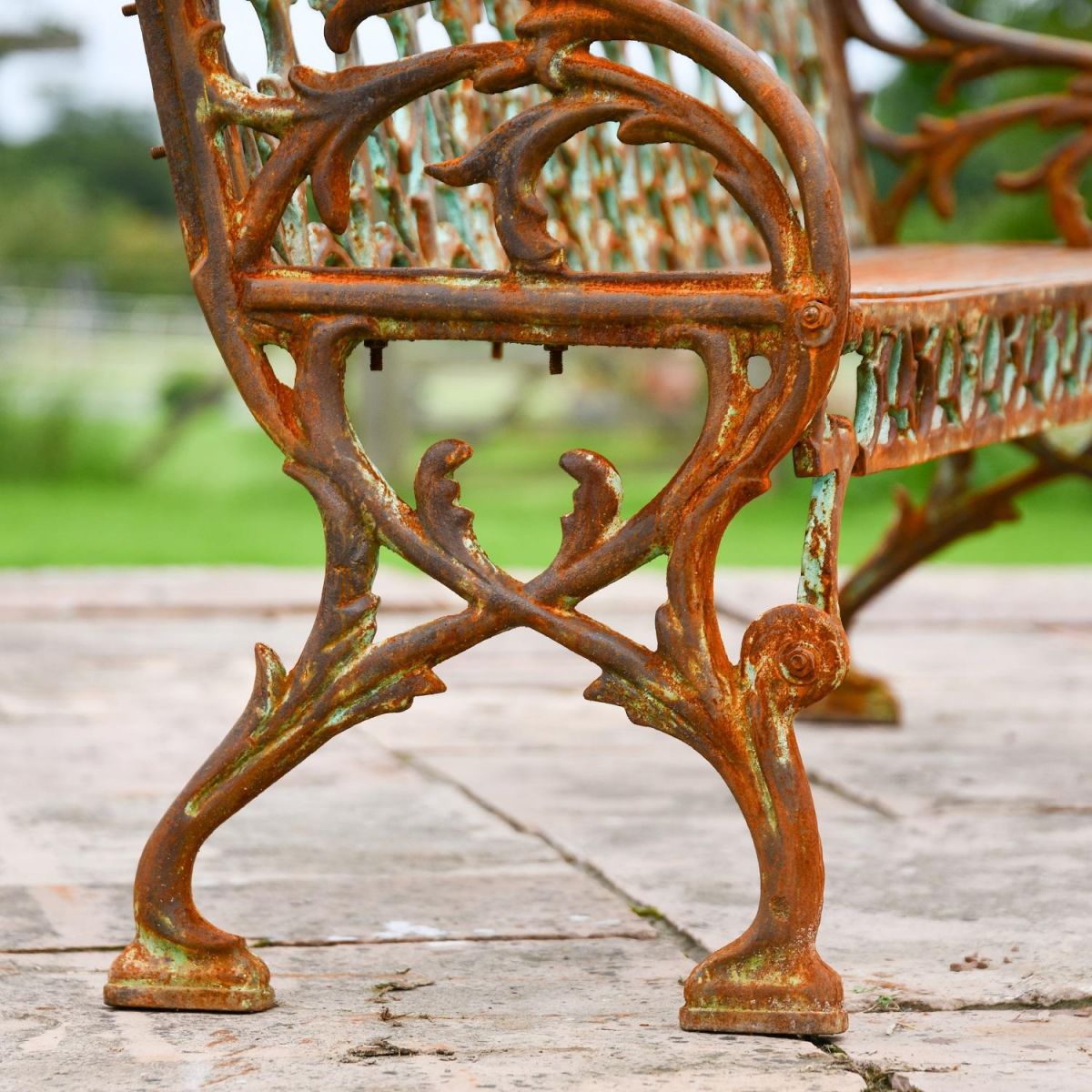 Close up of Rustic Cast Iron Leg on "Quatrefoil" Garden Bench
