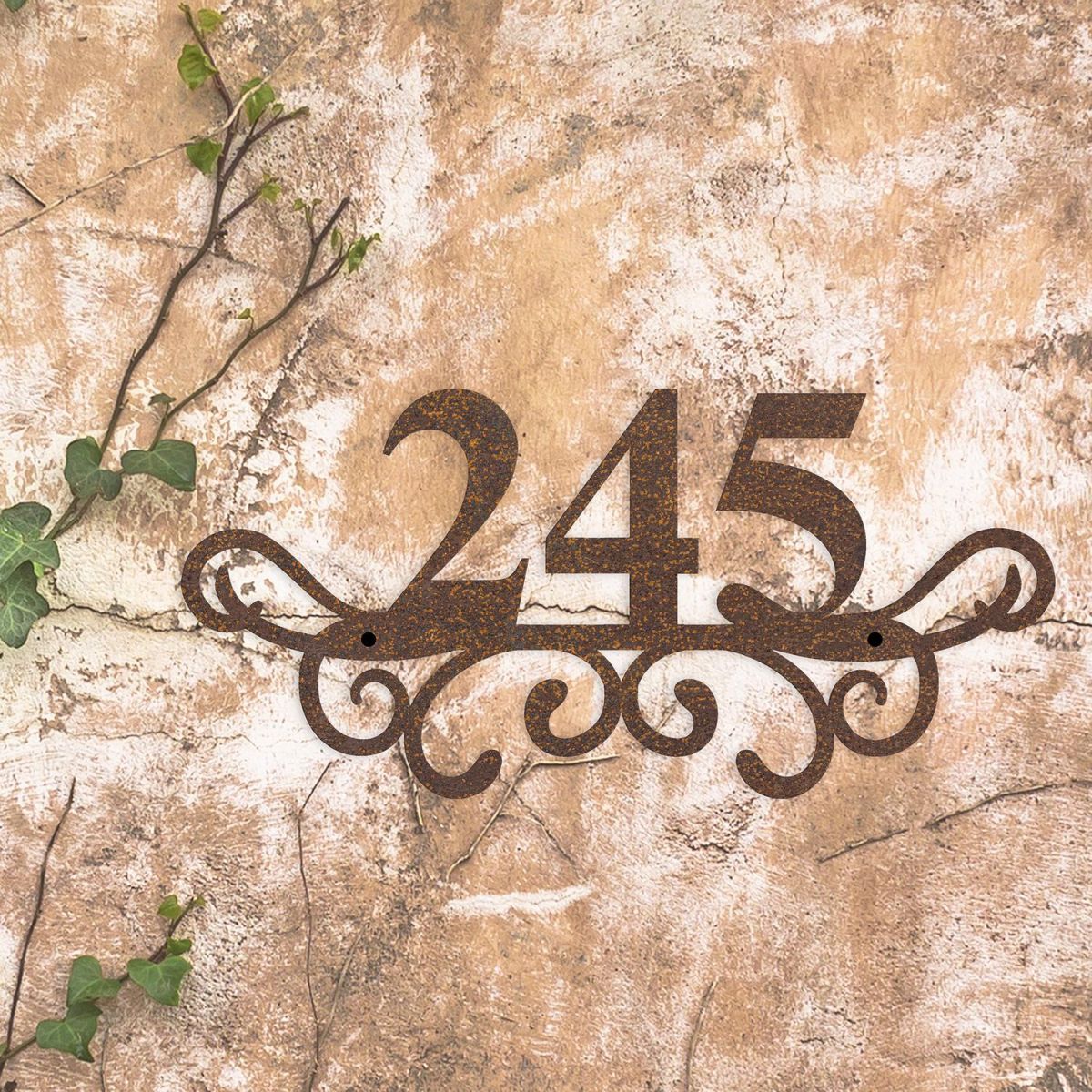 Traditional Iron Ornate Number Sign on a Rustic Wall