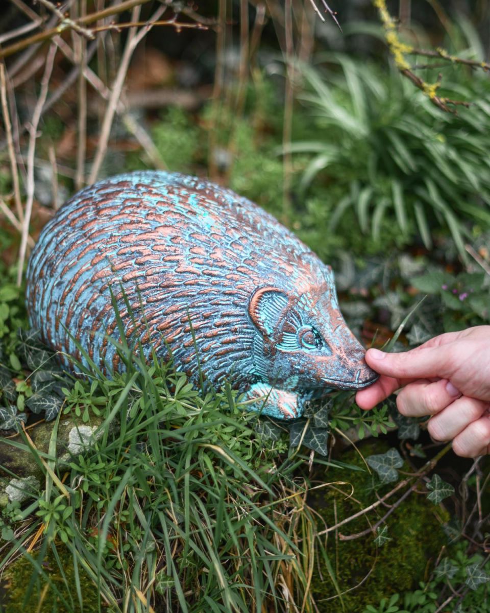 Scale Shot of Rustic Verdigris Cast Aluminium Hedgehog Garden Sculpture in Situ