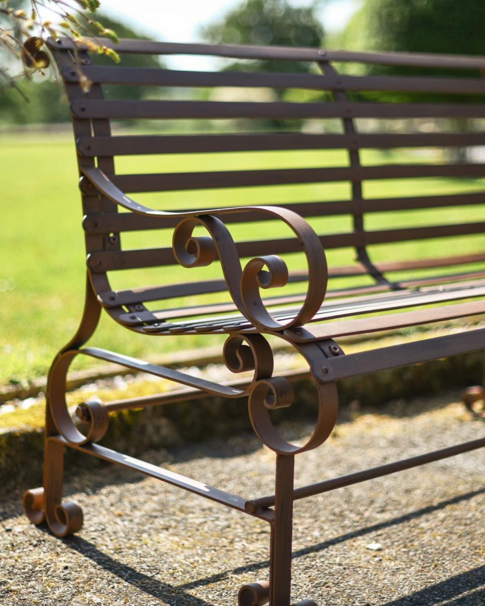 Close-Up of Armrest for Rustic Wrought Iron “Chatham" Two Seater Garden Bench