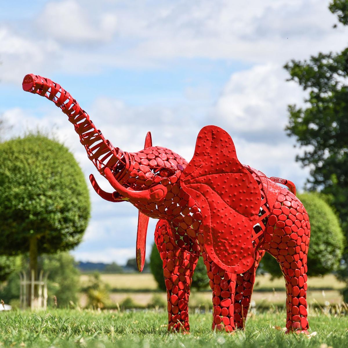"Sambaku" Red Garden Elephant Sculpture in Use in the Garden