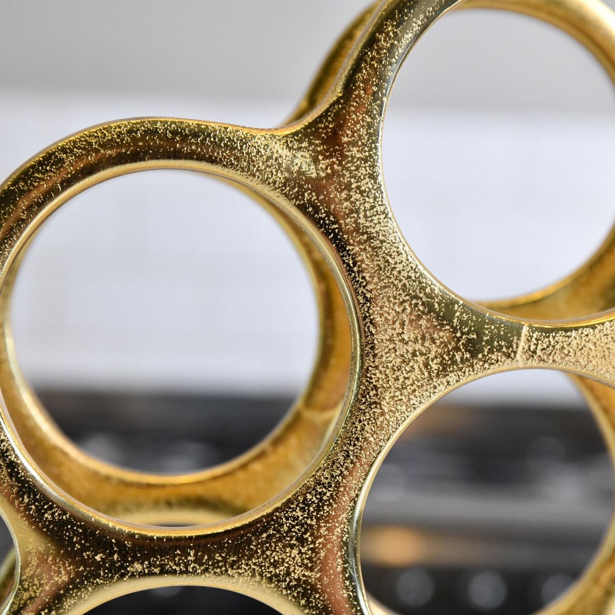 Close up of bottle holder on "Floating Bubbles" Wine Rack 