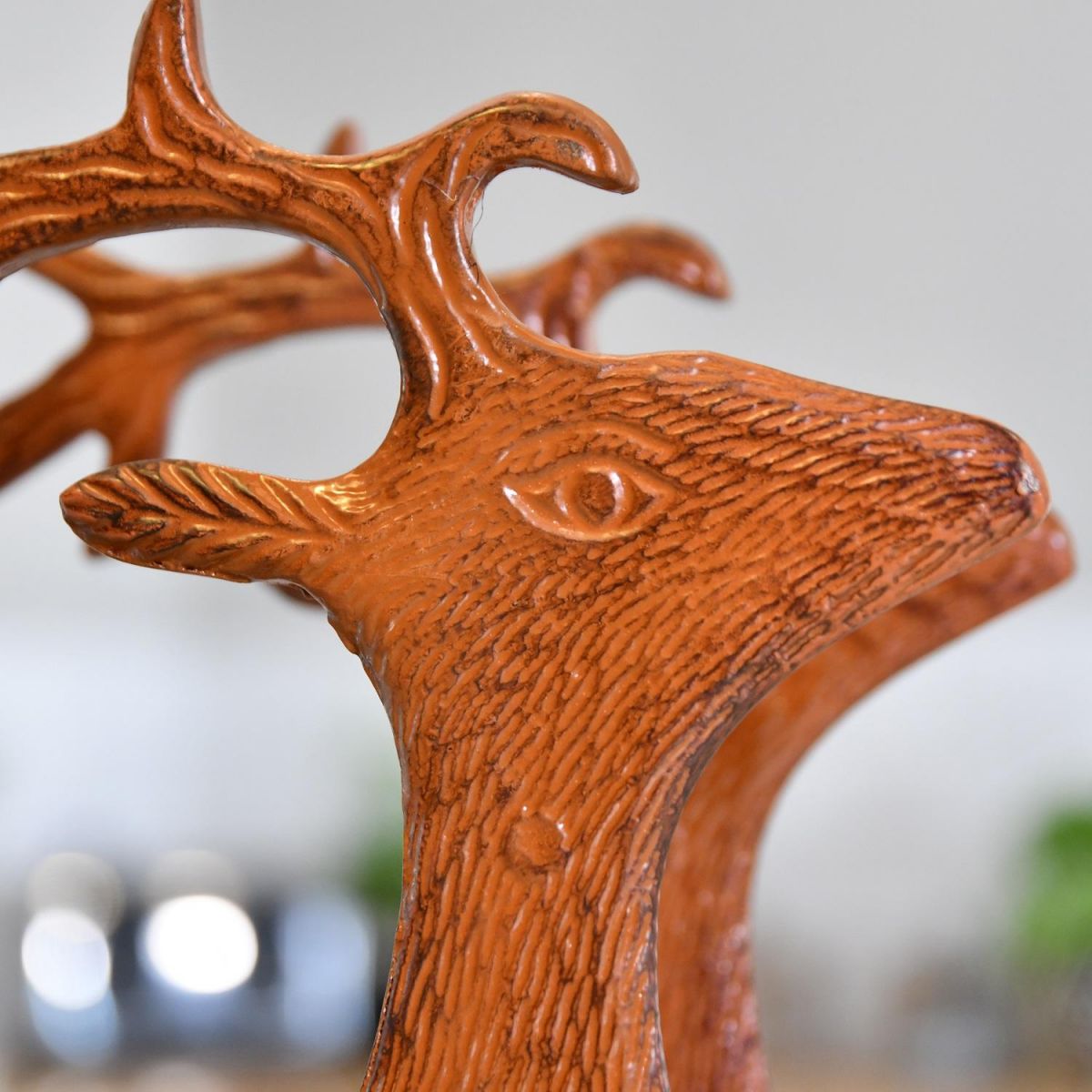 Close up of head of rustic "Laying Stag" with detailing 