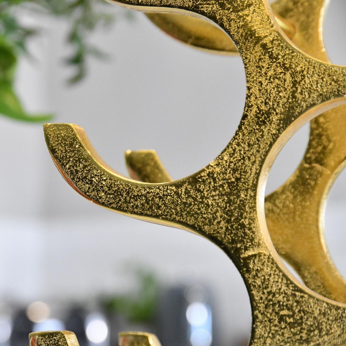 Close up of Gold Wine Bottle Holder 