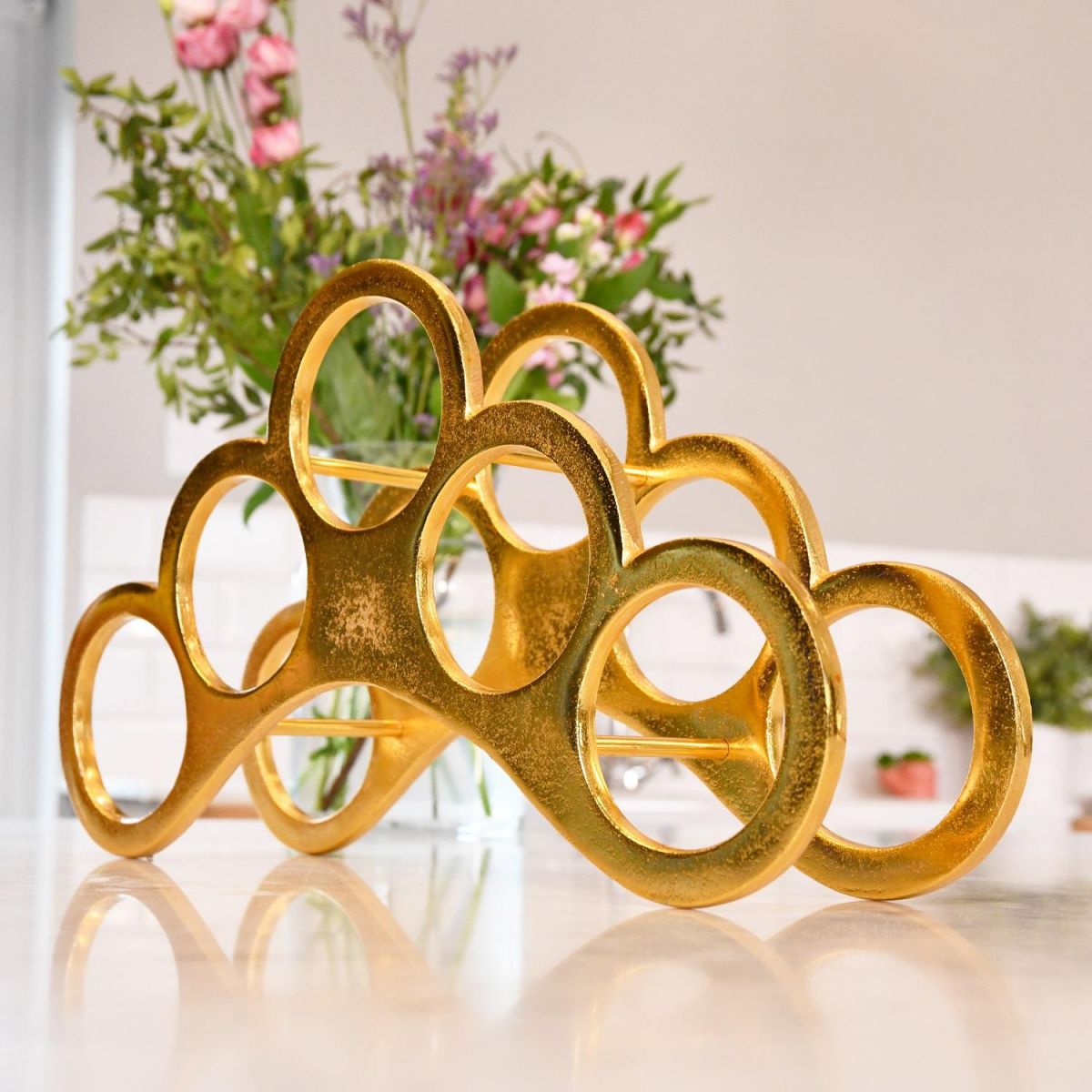 "The Arch" Wine Rack in Gold Finish on Countertop 
