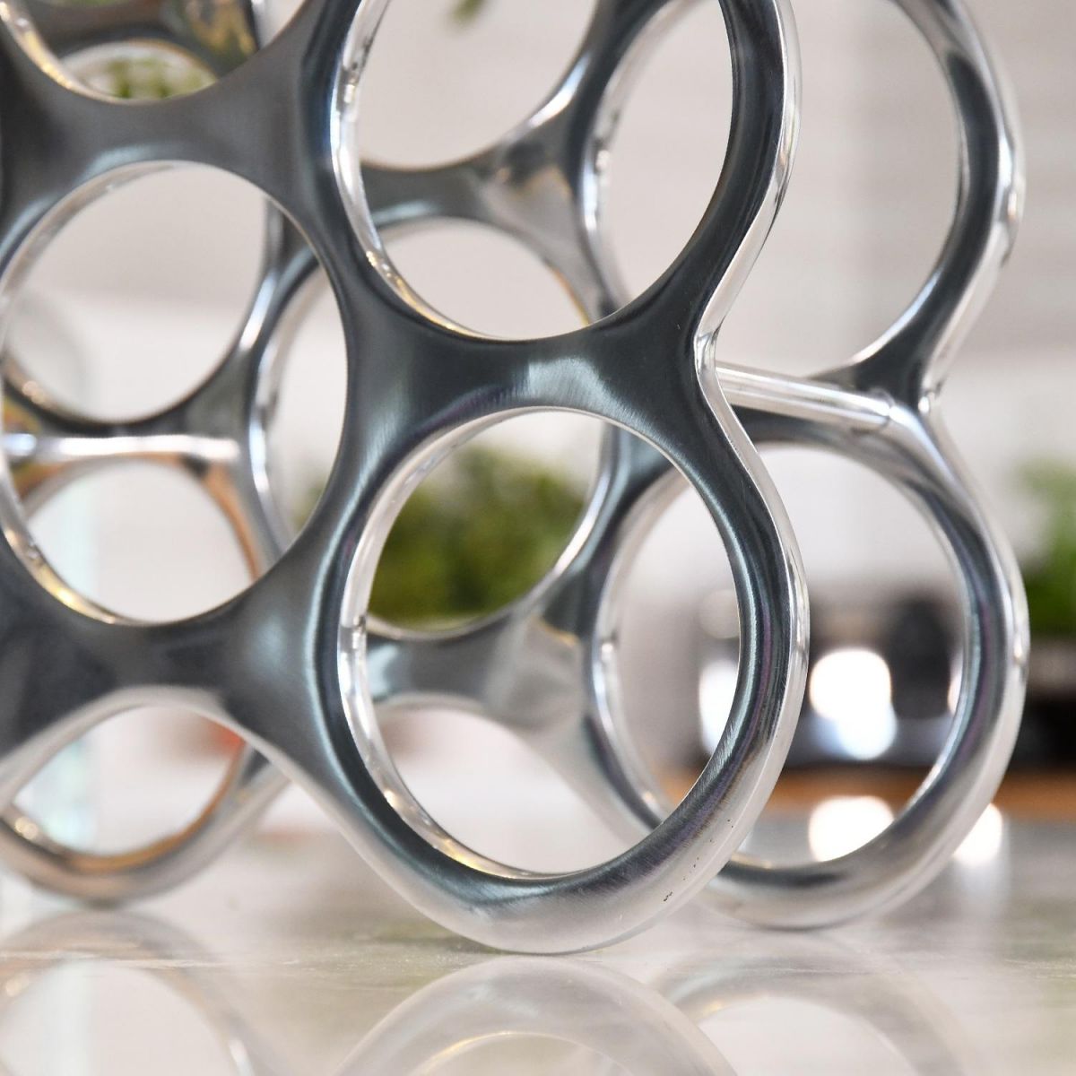 Close up of circular wine rack on kitchen countertop 