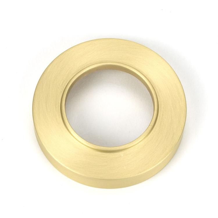 Close-Up of Backplate for Satin Brass "Royale" Unsprung Door Handle on Rose Set