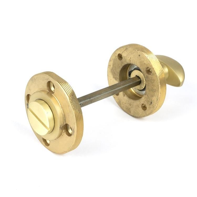 Close-Up of Connected Satin Brass Square "Vienna" Round Bathroom Thumb Lock - Set