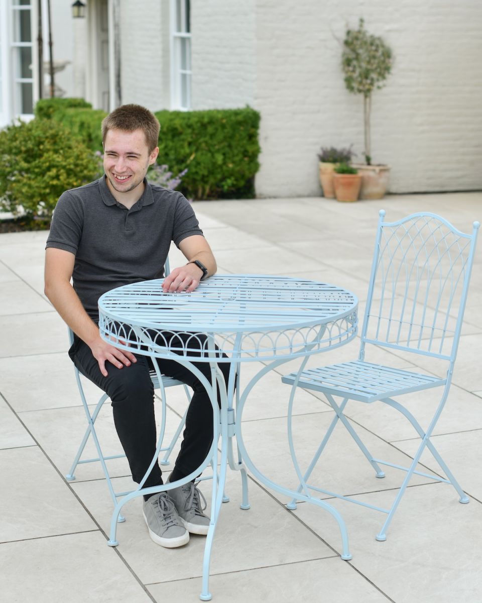 Scale image of blue outdoor furniture set