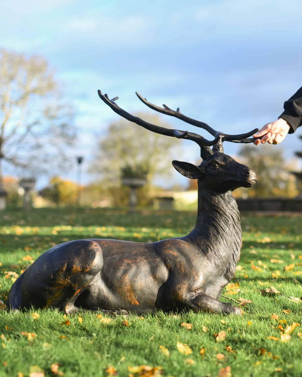 Scale Shot of Antique Bronze "General" Sitting Stag Garden Sculpture