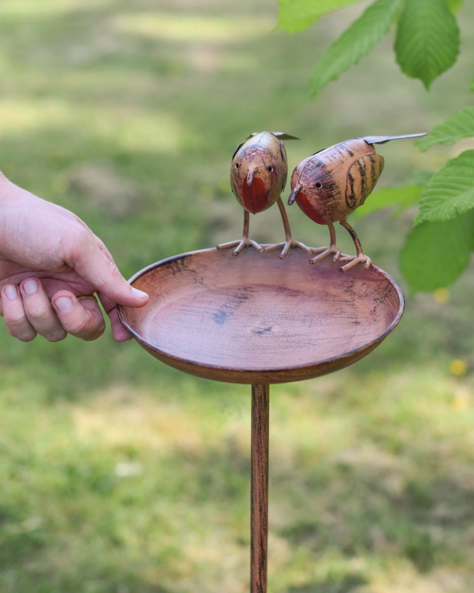 Scale view of steel bird feeder