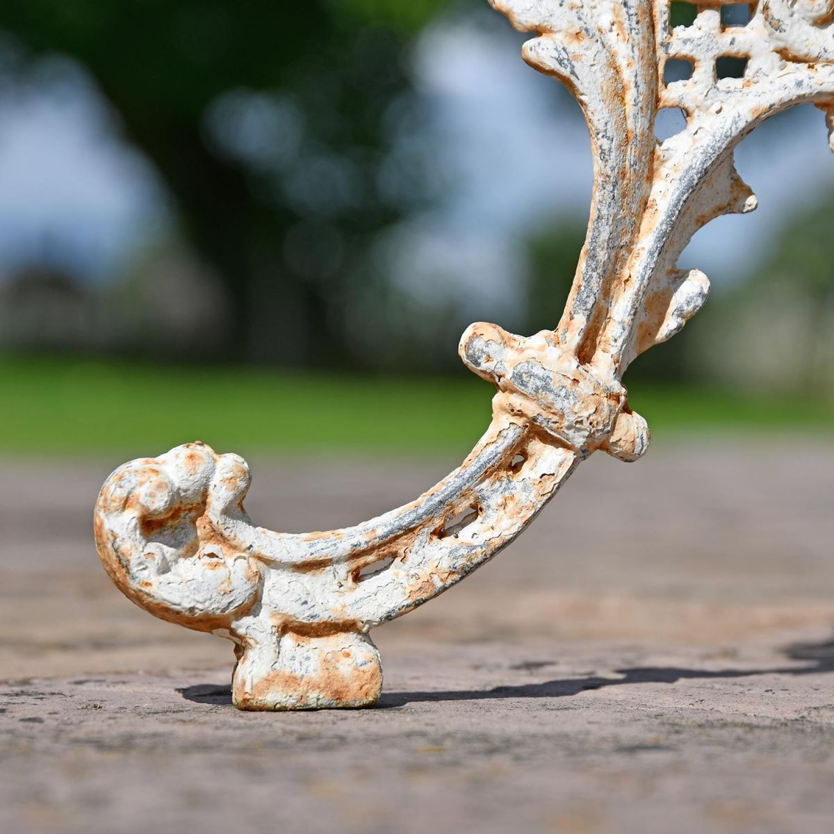 Close-up o fthe Legs on the Serpent Gothic Rustic Cream Cast Iron Side Table