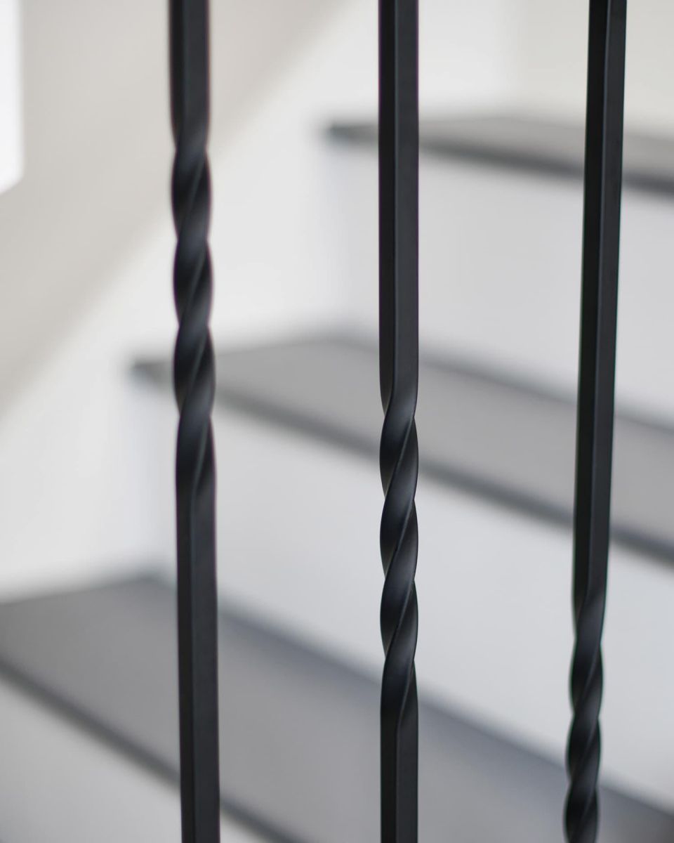 Close-Up of Set of 2 Matte Black "Enfield" Steel Stair Spindles - Pattern 4 - Spindle ONLY - No Brackets