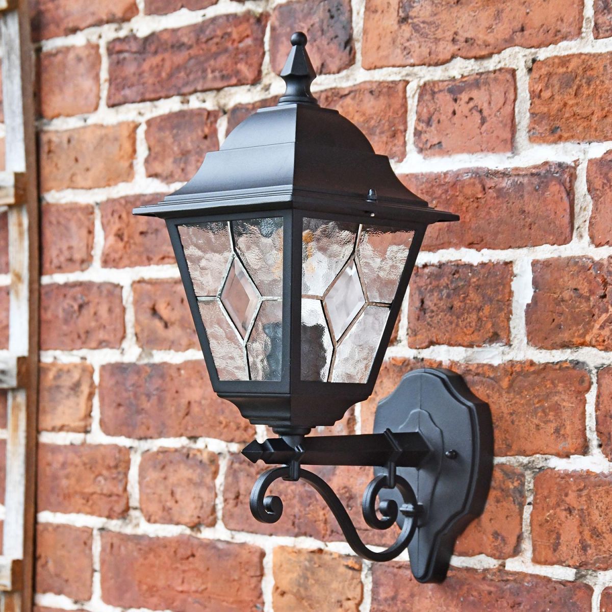 Traditional Black Bottom Fix Wall Lantern in Situ on a Brick Wall