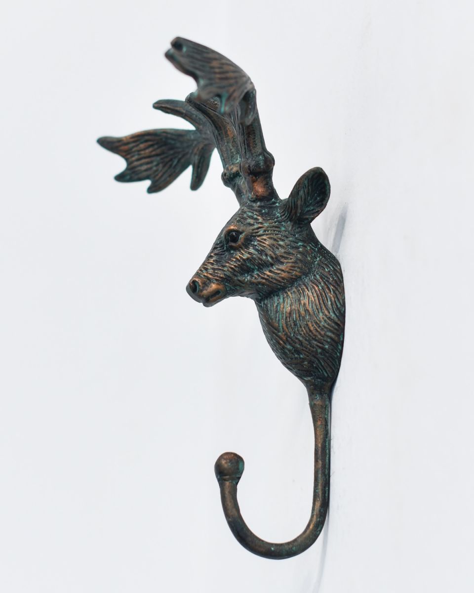 Side view of cast aluminium elk head hook