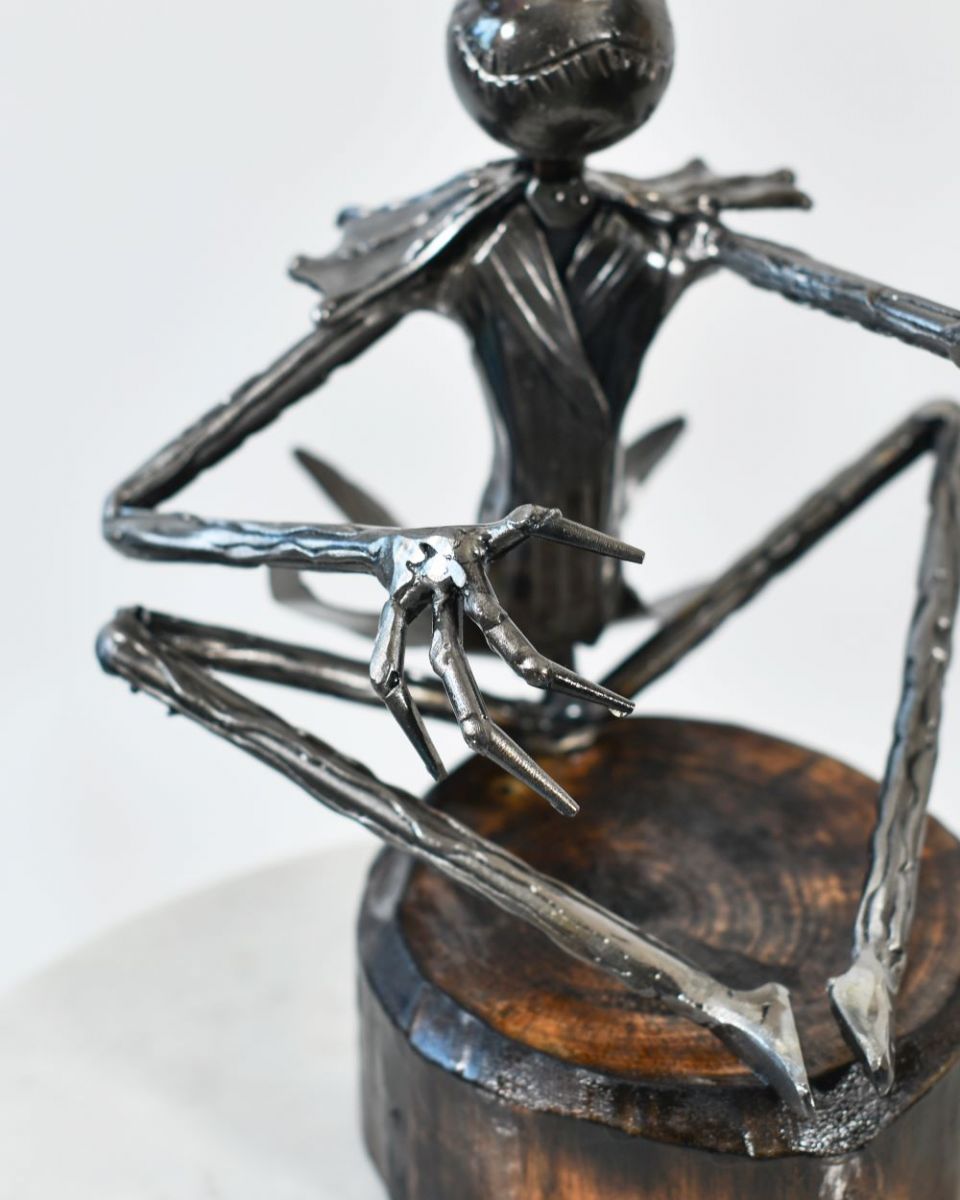 Close up of The Sitting Pumpkin King Sculpture hand