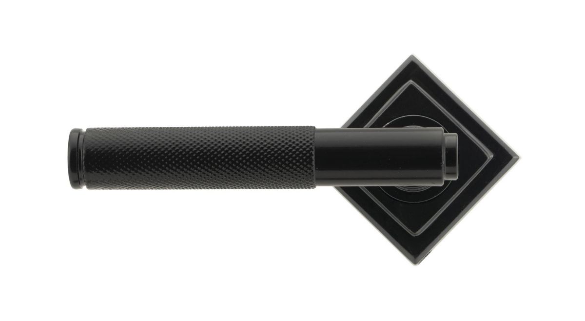 Sleek Black Textured Unsprung Lever Door Handle on Diamond Rose