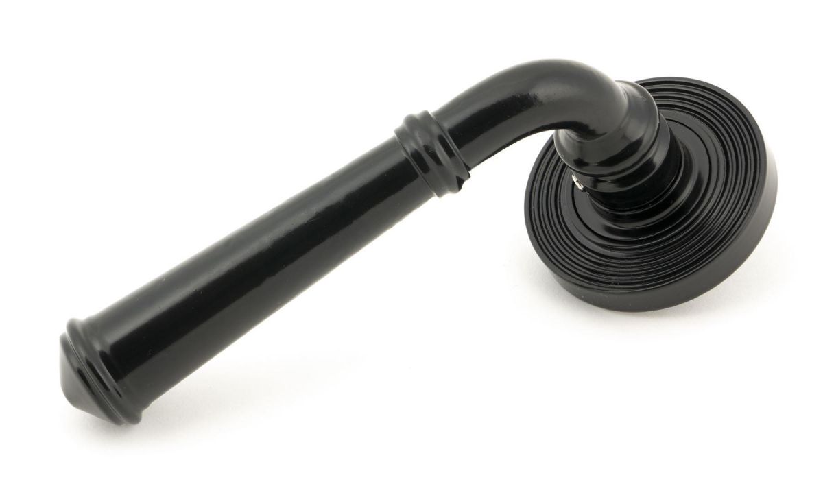 Sleek Midnight Black Lever Door Handle on Beehive Rose