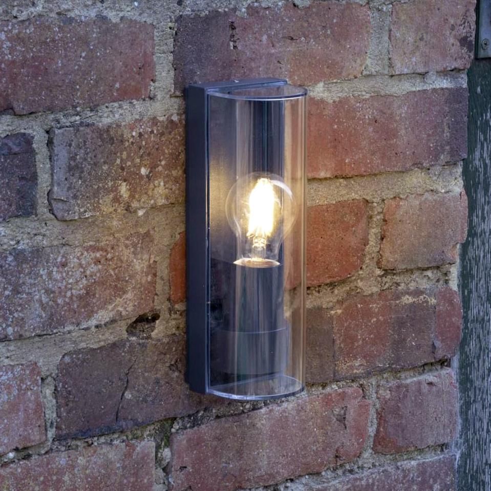 Slim Curved Wall Light in Situ on a Brick Wall