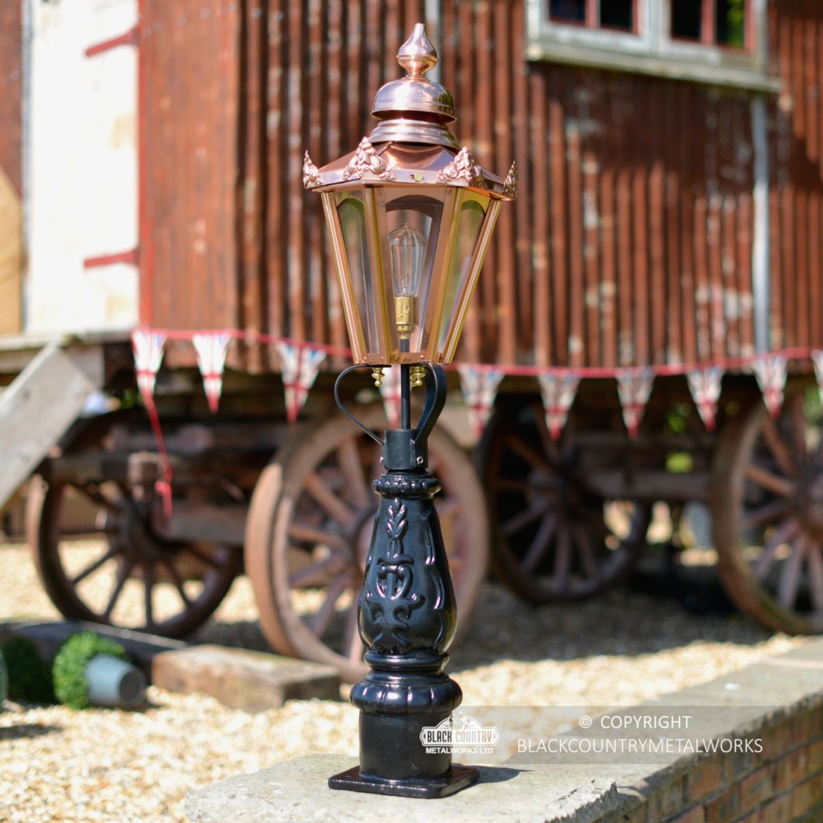 Copper Concordia Patio or Driveway Lighting in Situ on a Brick Pillar