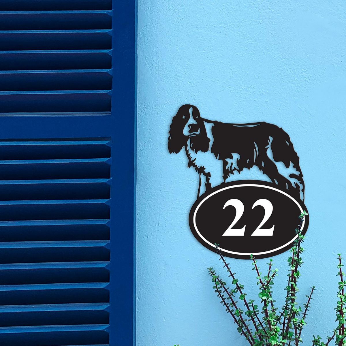 Springer Spaniel Iron House Number Sign in Situ on a Blue Wall 