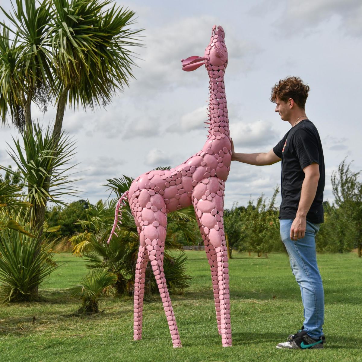 Scale Shot of Steel "Lady Jengo" Baby Giraffe Sculpture - Pink