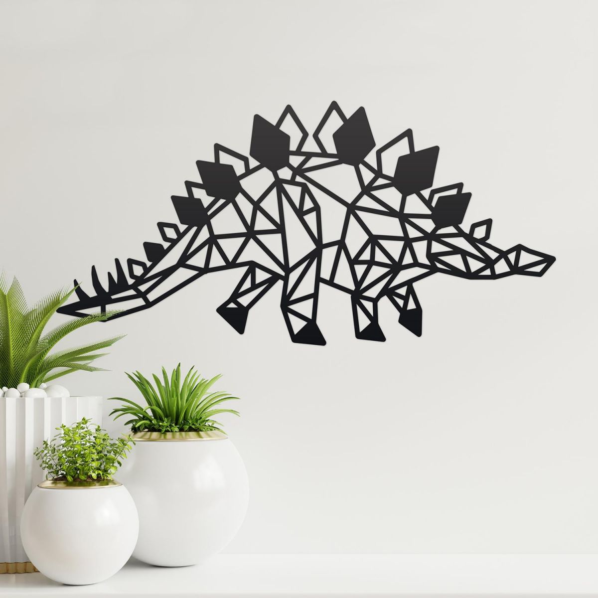 Geometric Iron Stegosaurus Wall Art on a Cream Wall