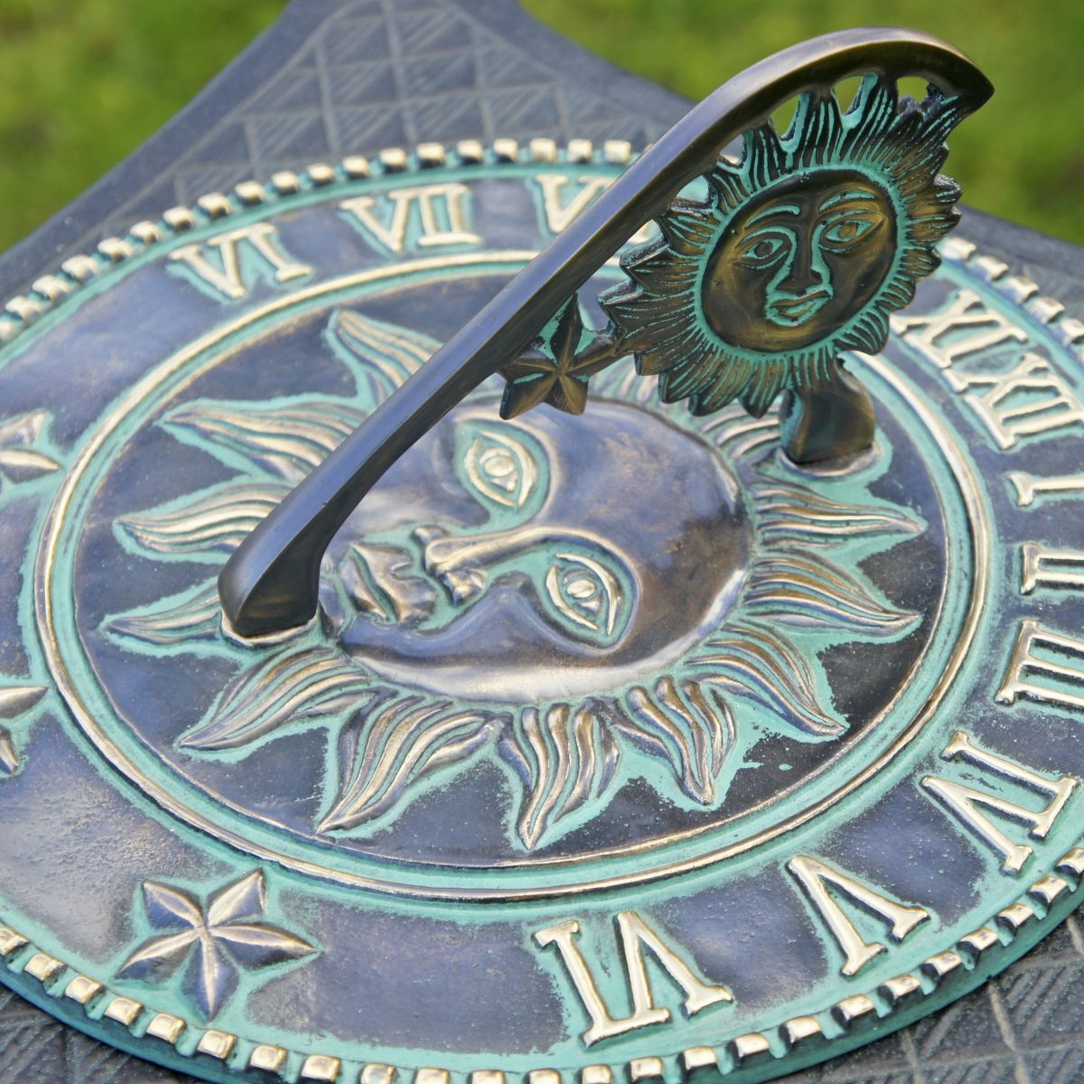 Beautiful antique sundial with large sun face