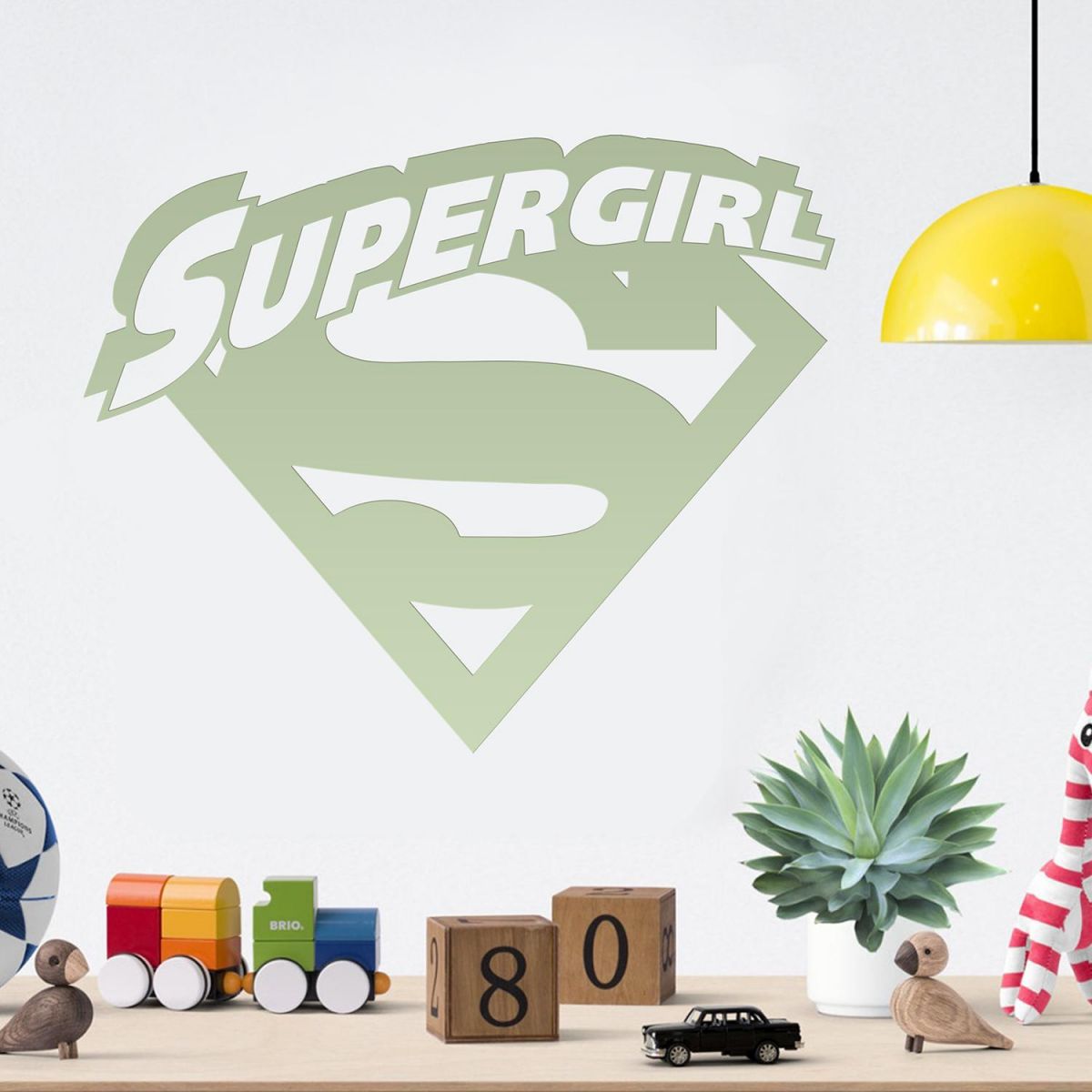 "Supergirl" Wall Art in a Children"s Play Room
